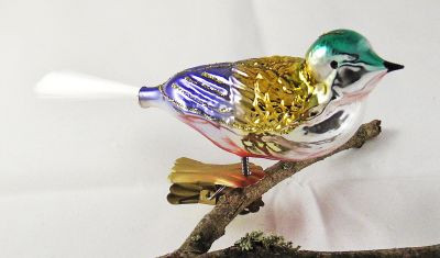 Vogel mit gedrehten Kopf, gespritzt Nr. 20, blau, gold, grün