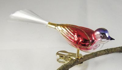 kleiner Vogel mit gedrehten Kopf, gespritzt Nr. 425, blau, rot, gold